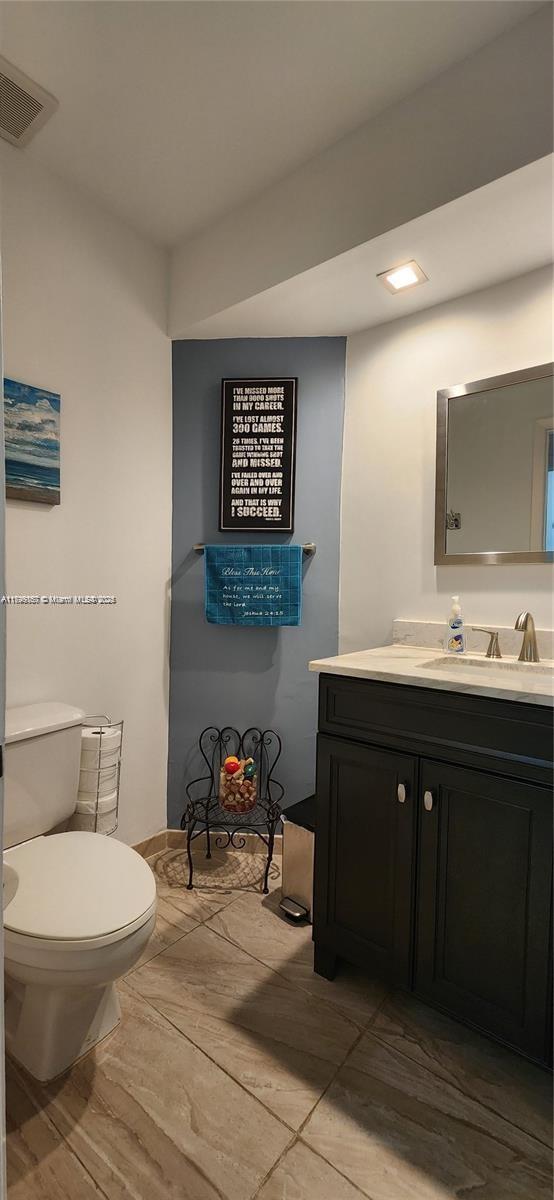 16624 Greens Edge Cir Unit 75, Weston, FL 33326 - bathroom with vanity and toilet