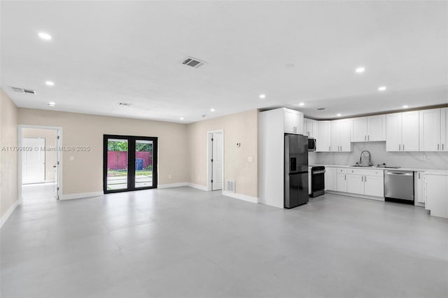 9300 Marine Dr, Cutler Bay, FL 33189 - kitchen featuring appliances with stainless steel finishes, recessed lighting, light countertops, open floor plan, and white cabinets