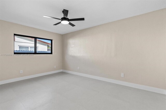 9300 Marine Dr, Cutler Bay, FL 33189 - empty room featuring a ceiling fan and baseboards