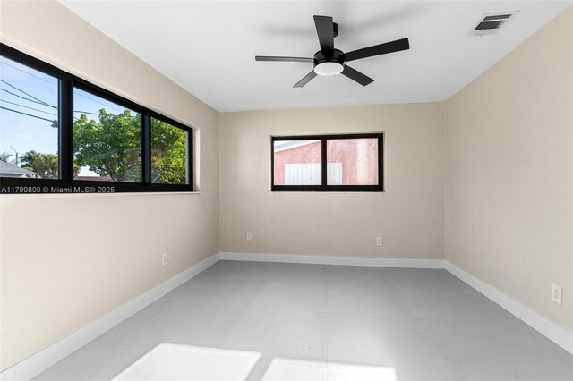 9300 Marine Dr, Cutler Bay, FL 33189 - empty room with a ceiling fan and baseboards