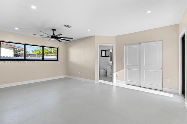 9300 Marine Dr, Cutler Bay, FL 33189 - unfurnished bedroom with baseboards, recessed lighting, ensuite bathroom, a closet, and finished concrete floors