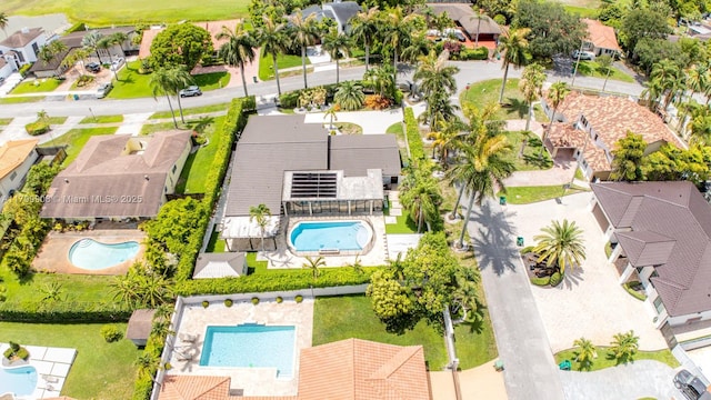 7345 N Oakmont Dr, Hialeah, FL 33015 - aerial perspective of suburban area with a pool