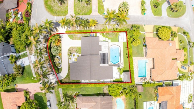 7345 N Oakmont Dr, Hialeah, FL 33015 - aerial view of property and surrounding area with a pool and property boundaries highlighted