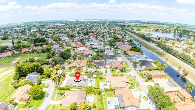 7345 N Oakmont Dr, Hialeah, FL 33015 - aerial perspective of suburban area with a nearby body of water