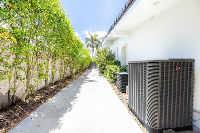 7345 N Oakmont Dr, Hialeah, FL 33015 - exterior space featuring central air condition unit and stucco siding