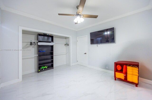 7345 N Oakmont Dr, Hialeah, FL 33015 - unfurnished bedroom featuring marble look tiles, baseboards, crown molding, ceiling fan, and a closet