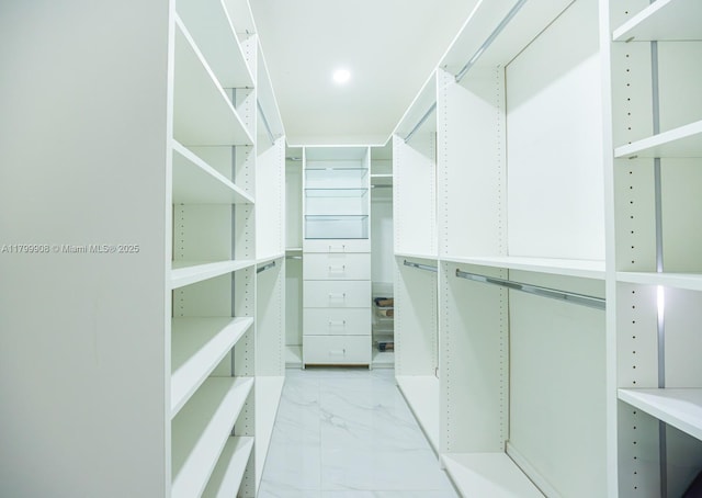 7345 N Oakmont Dr, Hialeah, FL 33015 - walk in closet with marble finish flooring