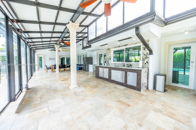 7345 N Oakmont Dr, Hialeah, FL 33015 - unfurnished sunroom featuring a sink and french doors