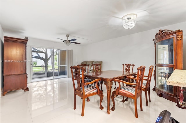 12501 SW 14th St Unit 108R, Pembroke Pines, FL 33027 - dining area featuring a ceiling fan and light tile patterned floors