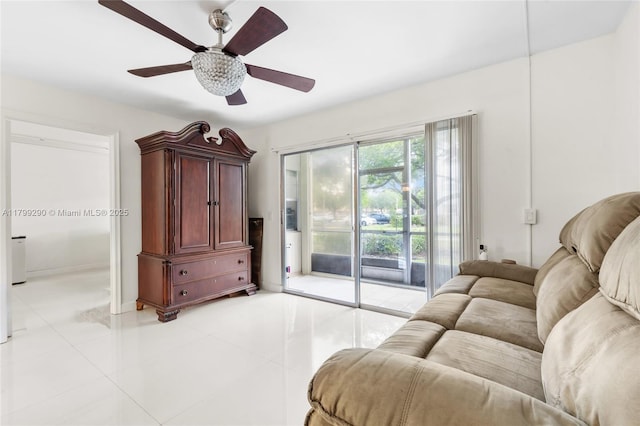12501 SW 14th St Unit 108R, Pembroke Pines, FL 33027 - living room with light tile patterned floors and a ceiling fan