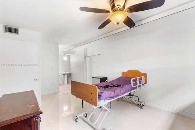 12501 SW 14th St Unit 108R, Pembroke Pines, FL 33027 - tiled bedroom with baseboards and ceiling fan