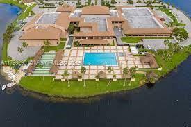 12501 SW 14th St Unit 108R, Pembroke Pines, FL 33027 - drone / aerial view of a nearby body of water