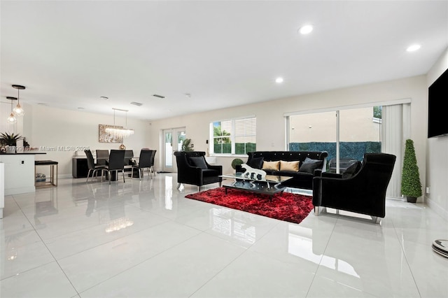 1463 NW 48th Ave, Coconut Creek, FL 33063 - living area with recessed lighting, baseboards, light tile patterned flooring, and a chandelier