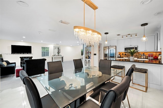 1463 NW 48th Ave, Coconut Creek, FL 33063 - dining space featuring light tile patterned floors, a chandelier, and recessed lighting