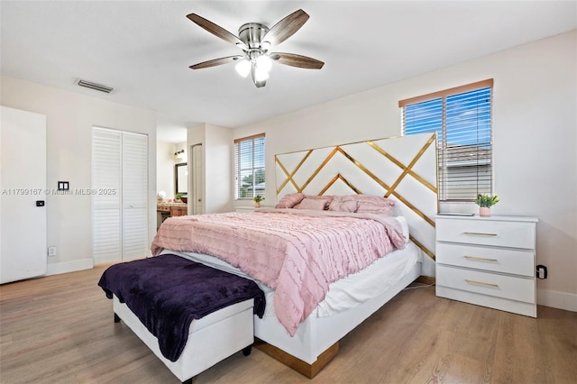 1463 NW 48th Ave, Coconut Creek, FL 33063 - bedroom featuring wood finished floors, baseboards, and a ceiling fan