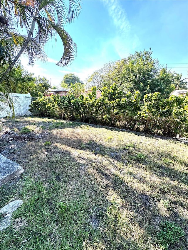view of yard with fence
