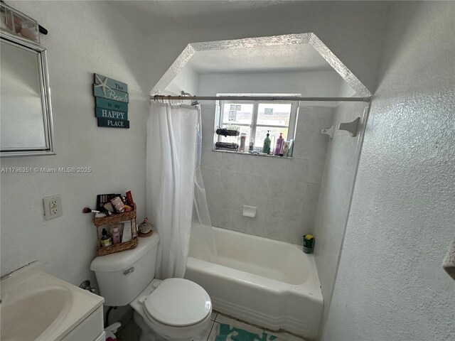 7435 Harding Ave Unit 101, Miami Beach, FL 33141 - full bathroom with shower / tub combo, toilet, and vanity