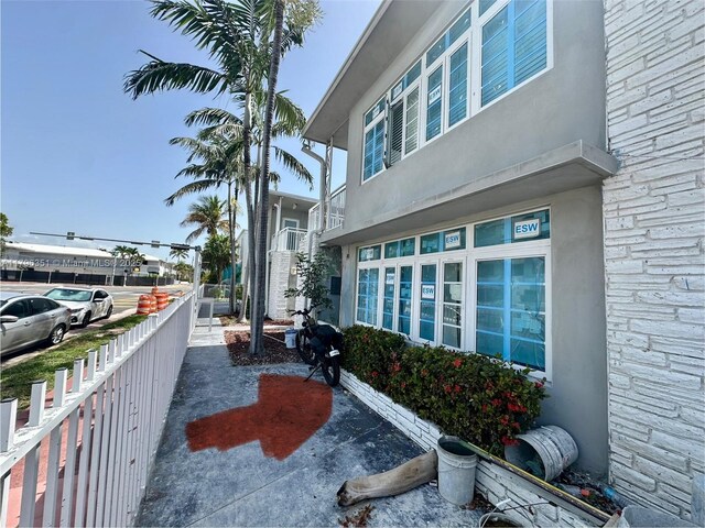 7435 Harding Ave Unit 101, Miami Beach, FL 33141 - view of home's exterior with stucco siding and stone siding