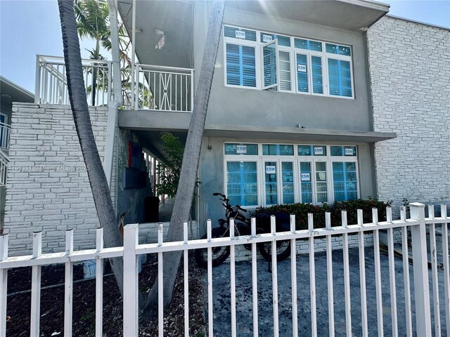 7435 Harding Ave Unit 101, Miami Beach, FL 33141 - view of side of property featuring stucco siding