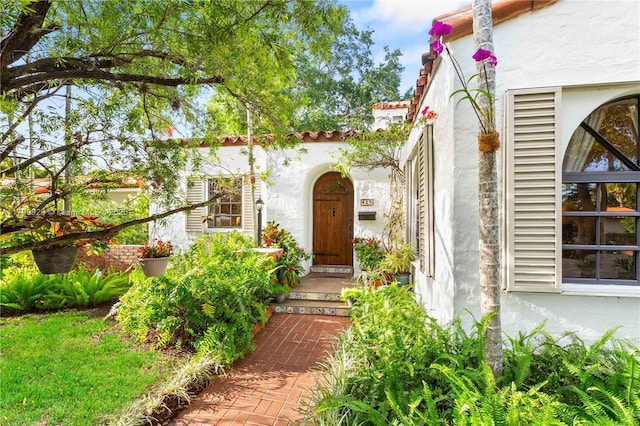 425 Cadagua Ave, Coral Gables, FL 33146 - doorway to property featuring stucco siding