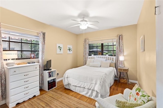 425 Cadagua Ave, Coral Gables, FL 33146 - bedroom featuring baseboards, wood finished floors, and ceiling fan