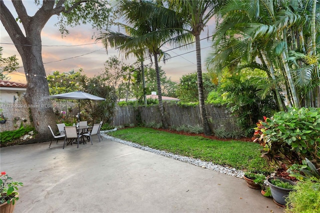 425 Cadagua Ave, Coral Gables, FL 33146 - view of patio with fence and outdoor dining area