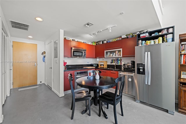 244 Biscayne Blvd Unit 645, Miami, FL 33132 - kitchen with stainless steel appliances, dark countertops, open shelves, finished concrete floors, and a sink