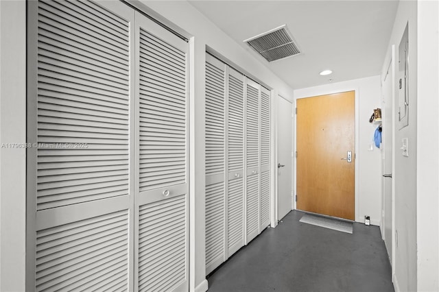 244 Biscayne Blvd Unit 645, Miami, FL 33132 - hall with finished concrete flooring and recessed lighting