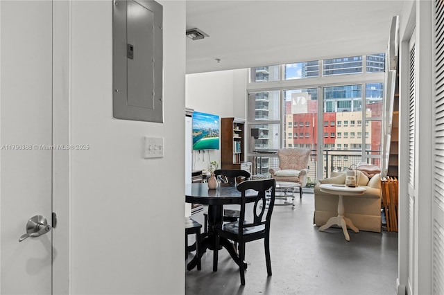 244 Biscayne Blvd Unit 645, Miami, FL 33132 - dining area featuring electric panel and finished concrete floors