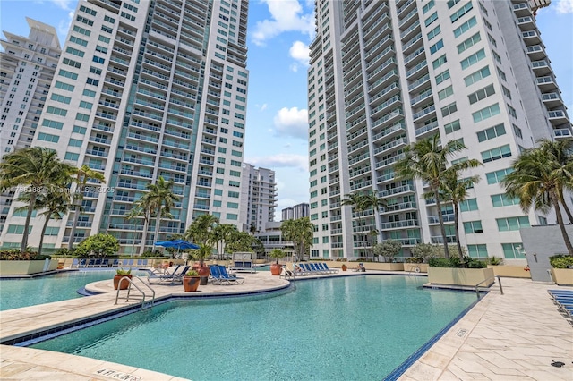 244 Biscayne Blvd Unit 645, Miami, FL 33132 - community pool featuring a city view and a patio area