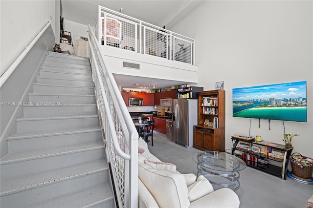 244 Biscayne Blvd Unit 645, Miami, FL 33132 - stairs featuring concrete flooring and a high ceiling