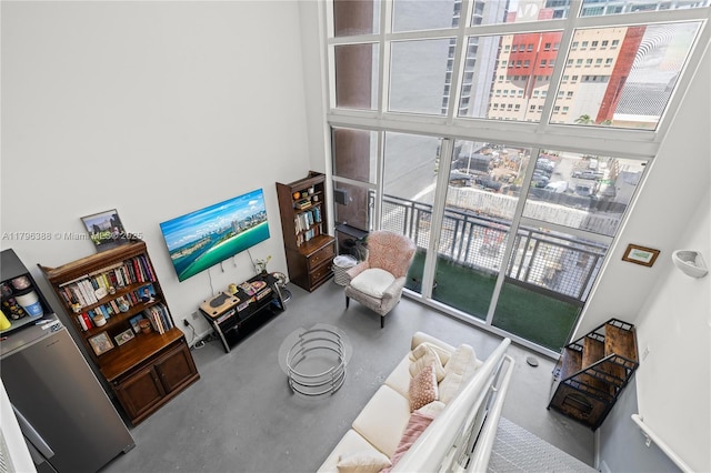 244 Biscayne Blvd Unit 645, Miami, FL 33132 - living area with a towering ceiling and floor to ceiling windows