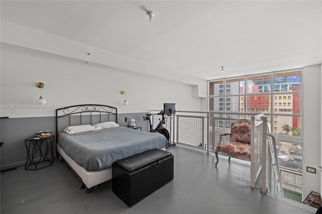 244 Biscayne Blvd Unit 645, Miami, FL 33132 - bedroom with concrete flooring and floor to ceiling windows