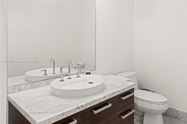 244 Biscayne Blvd Unit 645, Miami, FL 33132 - bathroom featuring vanity and toilet