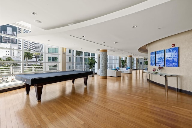 244 Biscayne Blvd Unit 645, Miami, FL 33132 - playroom with billiards table, hardwood / wood-style floors, and a wall of windows