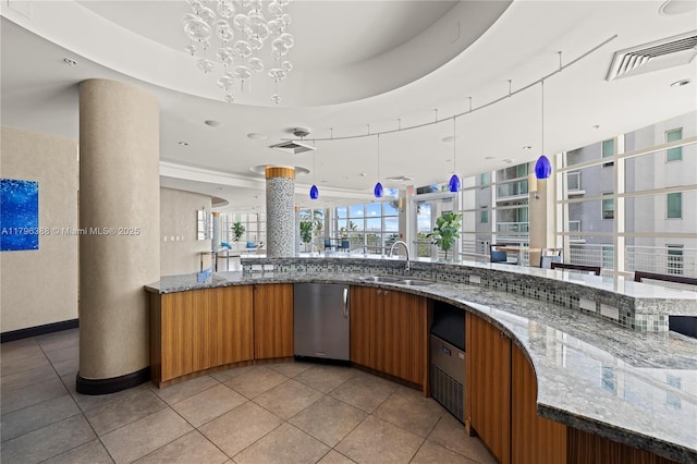 244 Biscayne Blvd Unit 645, Miami, FL 33132 - bar area featuring a sink and light tile patterned floors