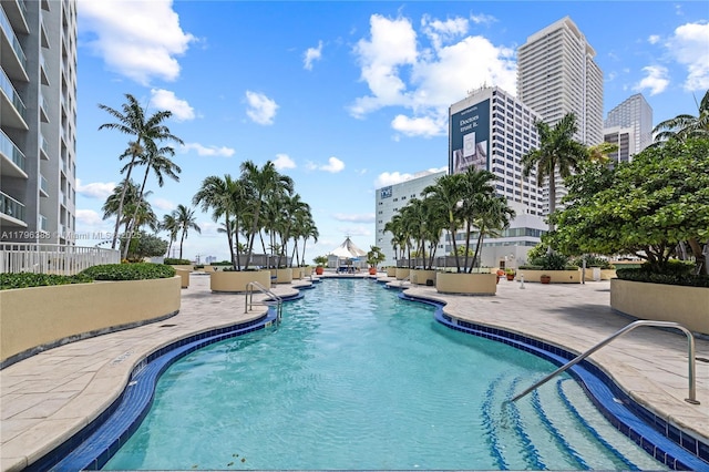 244 Biscayne Blvd Unit 645, Miami, FL 33132 - community pool featuring a patio area and fence