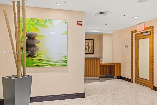 244 Biscayne Blvd Unit 645, Miami, FL 33132 - hall featuring recessed lighting, baseboards, and tile patterned floors