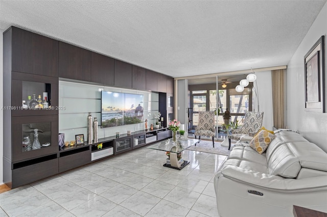 living room with a textured ceiling