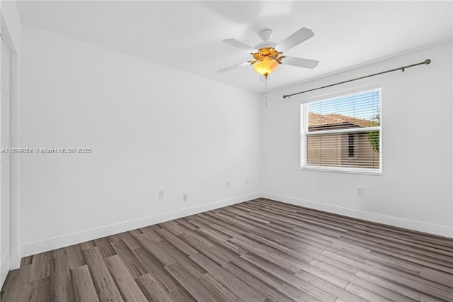 3372 SW 179th Ave, Miramar, FL 33029 - empty room with wood finished floors, baseboards, and ceiling fan