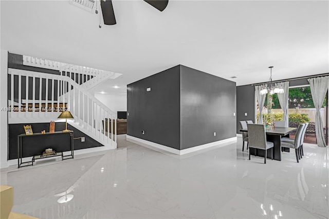 3372 SW 179th Ave, Miramar, FL 33029 - dining area featuring marble tiled floors, ceiling fan, stairs, a chandelier, and baseboards