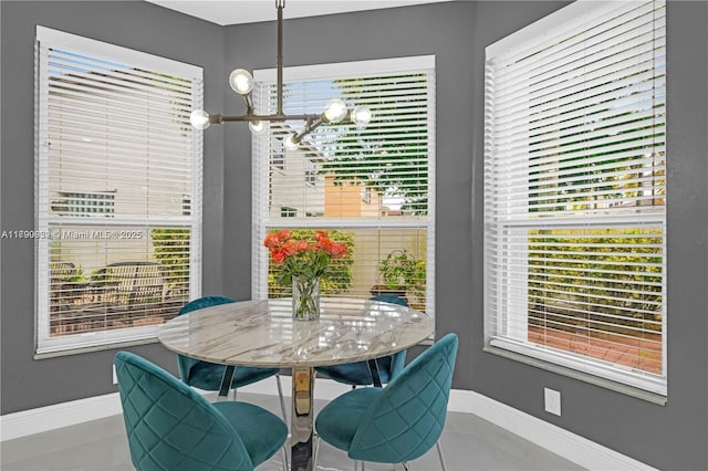 3372 SW 179th Ave, Miramar, FL 33029 - dining room featuring a chandelier and baseboards