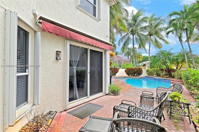 3372 SW 179th Ave, Miramar, FL 33029 - view of swimming pool with a patio area