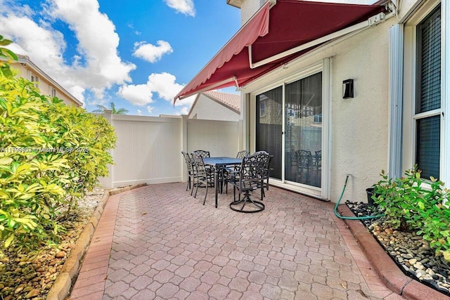 3372 SW 179th Ave, Miramar, FL 33029 - view of patio / terrace with outdoor dining space and fence