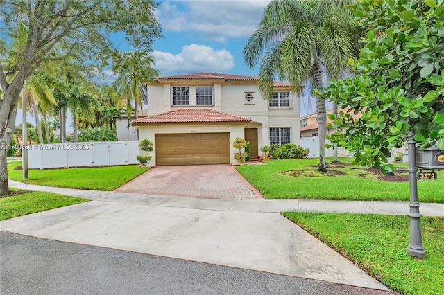 3372 SW 179th Ave, Miramar, FL 33029 - mediterranean / spanish house with stucco siding, decorative driveway, a tile roof, and a garage