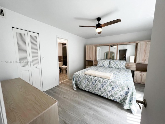 7950 W Mcnab Rd Unit 222, Tamarac, FL 33321 - bedroom with light wood-style floors, connected bathroom, a closet, and ceiling fan