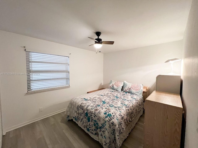 7950 W Mcnab Rd Unit 222, Tamarac, FL 33321 - bedroom with wood finished floors, baseboards, and a ceiling fan