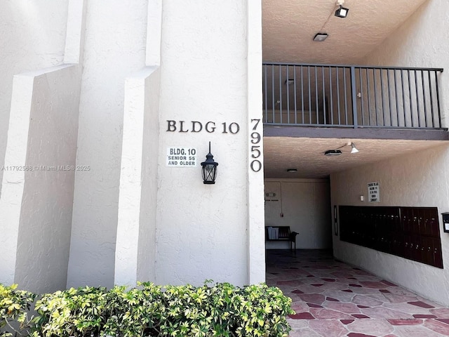 7950 W Mcnab Rd Unit 222, Tamarac, FL 33321 - property entrance featuring stucco siding
