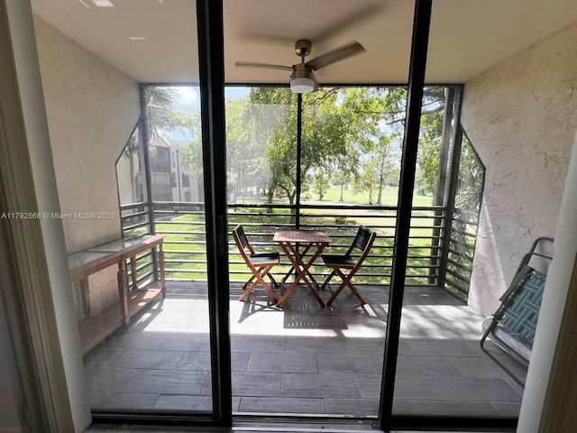 7950 W Mcnab Rd Unit 222, Tamarac, FL 33321 - unfurnished sunroom with a ceiling fan