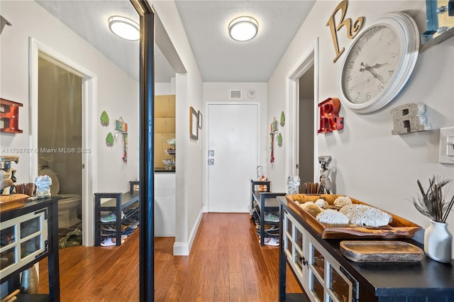 1470 NE 125th Ter Unit Ph9, North Miami, FL 33161 - hallway with wood finished floors and baseboards